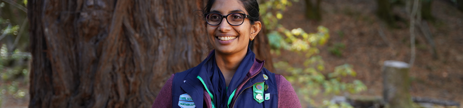  adult woman girl scout volunteer smiling outdoors  